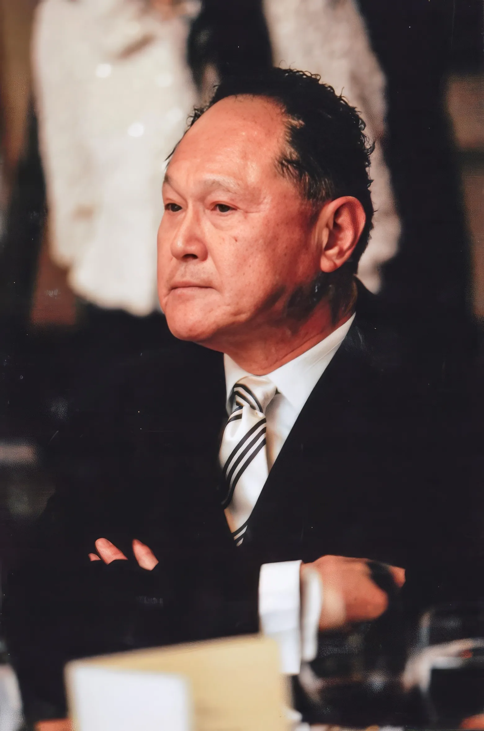 A photo of Dr. Cecil Chao in an event.