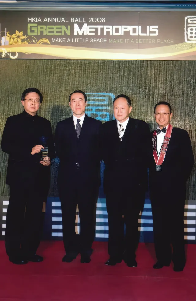 A photo of Dr. Cecil Chao with Mr. Henry Tang and friends during an event.