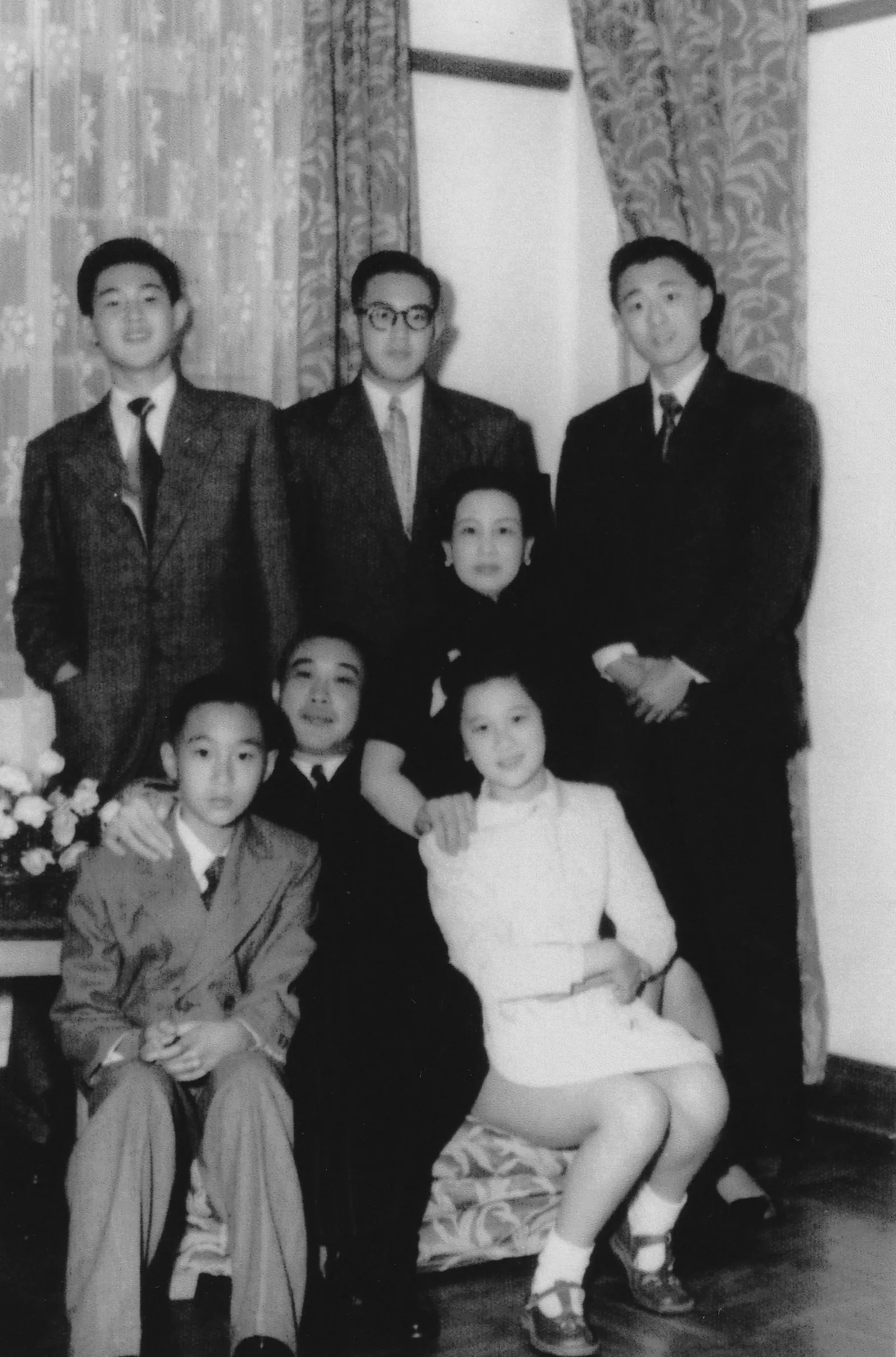 A photo of Dr. Cecil Chao in his youth with his parents and siblings.