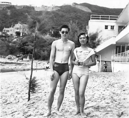 A photo of young Dr. Cecil Chao and friend on a beach.