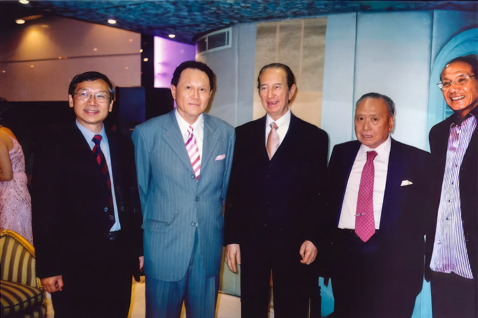A group photo of Dr. Cecil Chao with Mr.Stanley Ho Hung-sun and their friends attending an event.