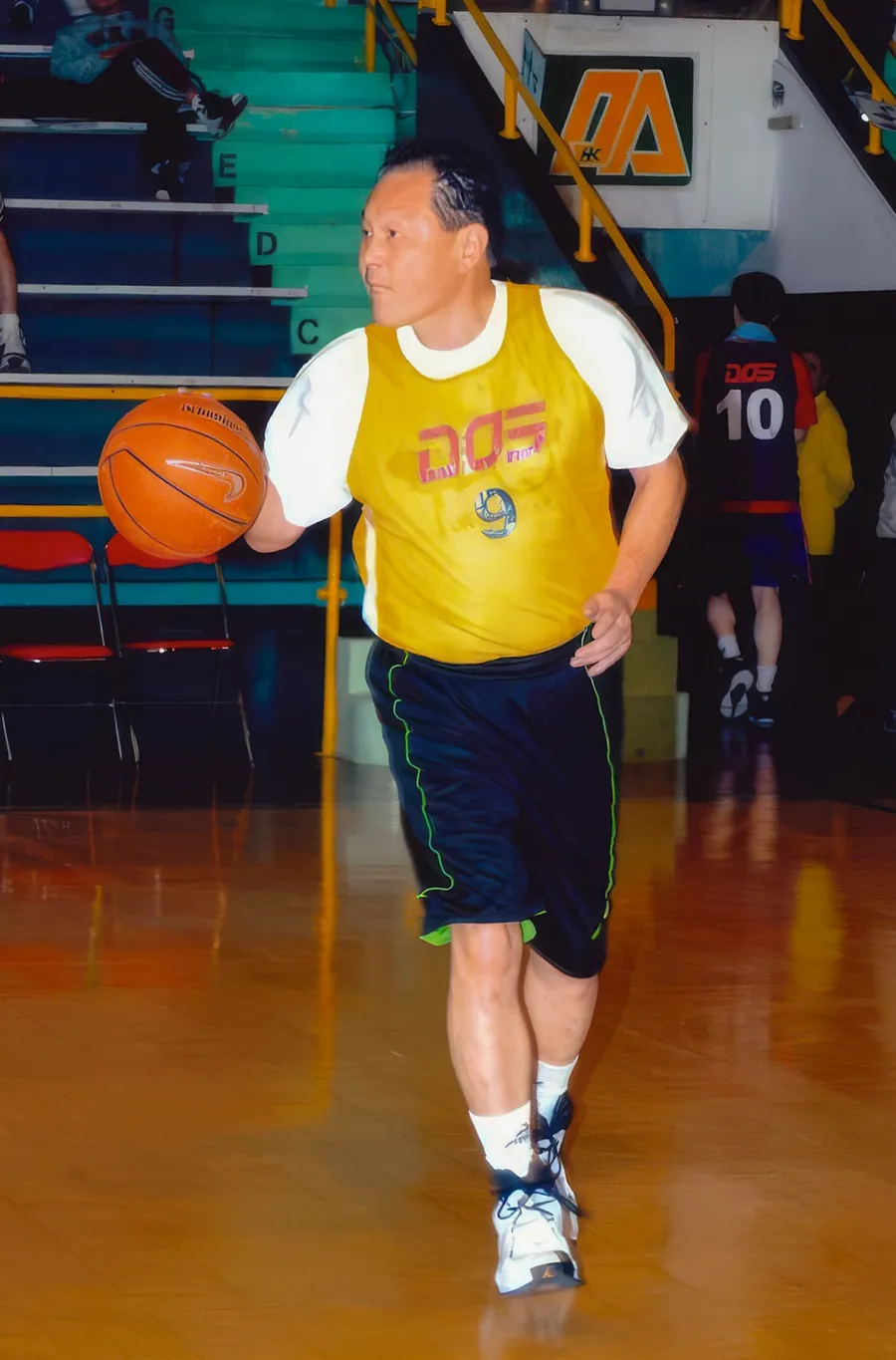 Dr. Cecil Chao demonstrating his basketball skills.