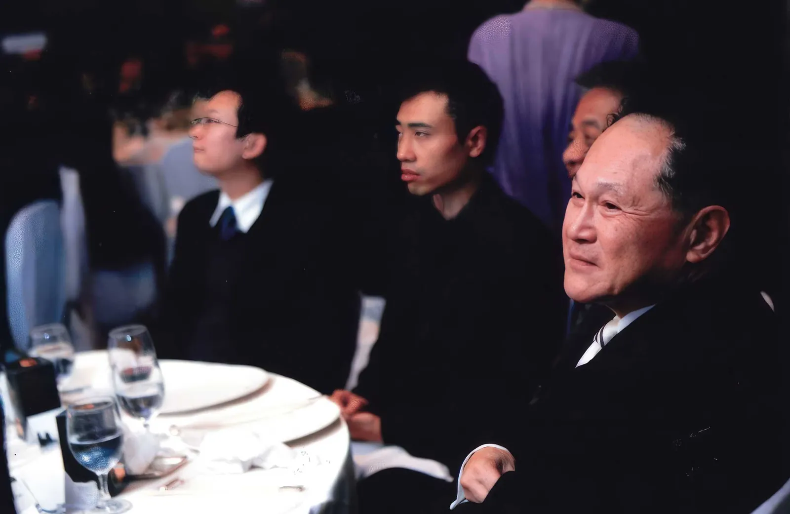 A photo of Dr. Cecil Chao attending a banquet.
