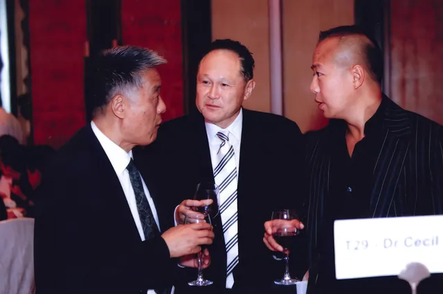 A photo of Dr. Cecil Chao with friends and business partners.