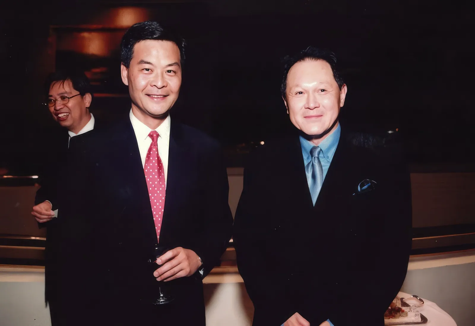A photo of Dr. Cecil Chao with Mr. Leung Chun-ying.