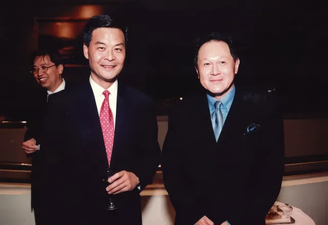 A photo of Dr. Cecil Chao with Mr. Leung Chun-ying.